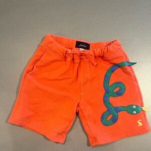 Joules Vibrant Orange Kids Shorts with Fun Snake Motif